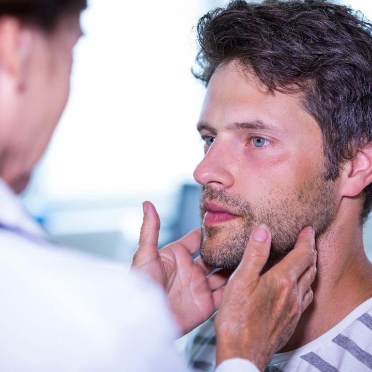 Doctor examining a patient at the hospital